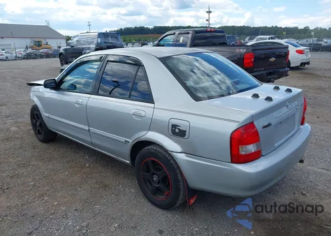 2000 Mazda Protege Dx/Lx z USA, uszkodzony, nr VIN JM1BJ2226Y0228628